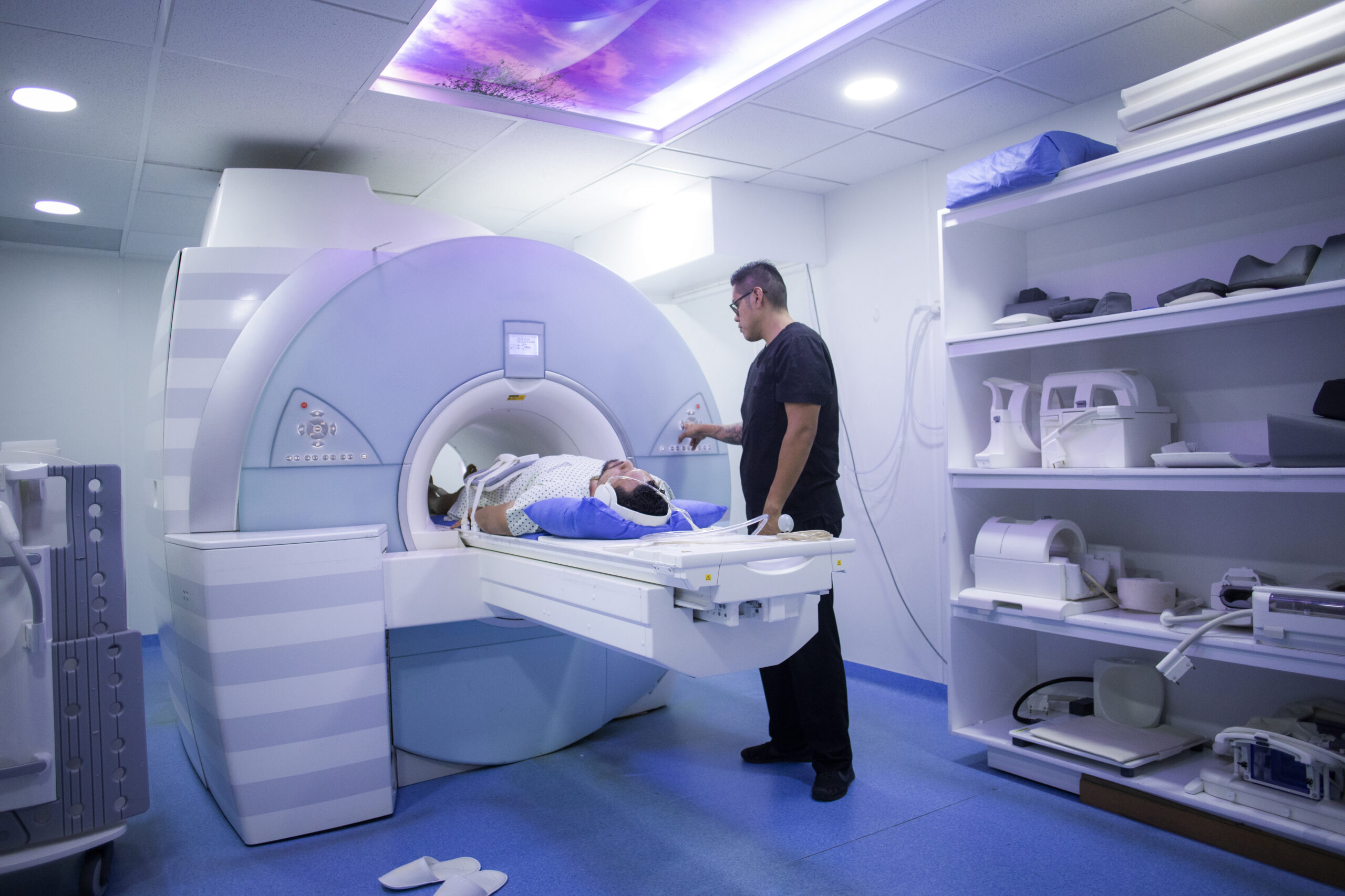 Man undergoing a MRI scan in a hospital stock phot